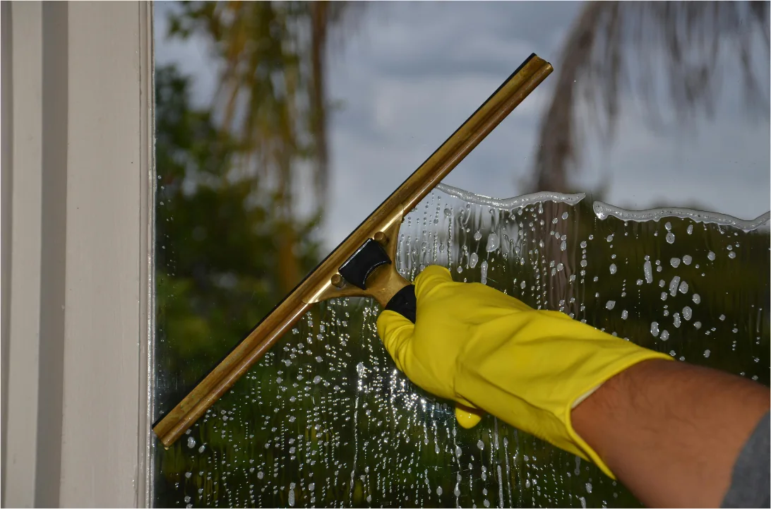 Residential window cleaning with a squeegee